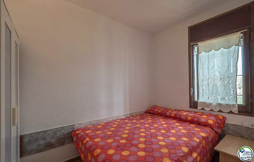 Apartament en una residència amb piscina