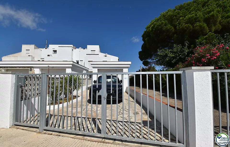 Two-bedroom fisherman's cottage with double terraces, garage, and mooring for sale