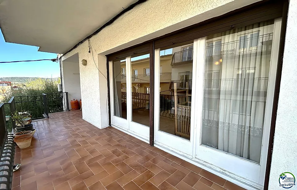 Flat situated in the centre of the village with large garage.